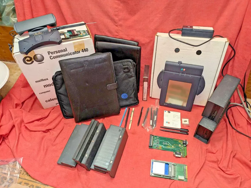 photo of GO's prototype pen computer hardware, electronic styli, battery packs, floppy drives and the EO 440 Personal Communicator