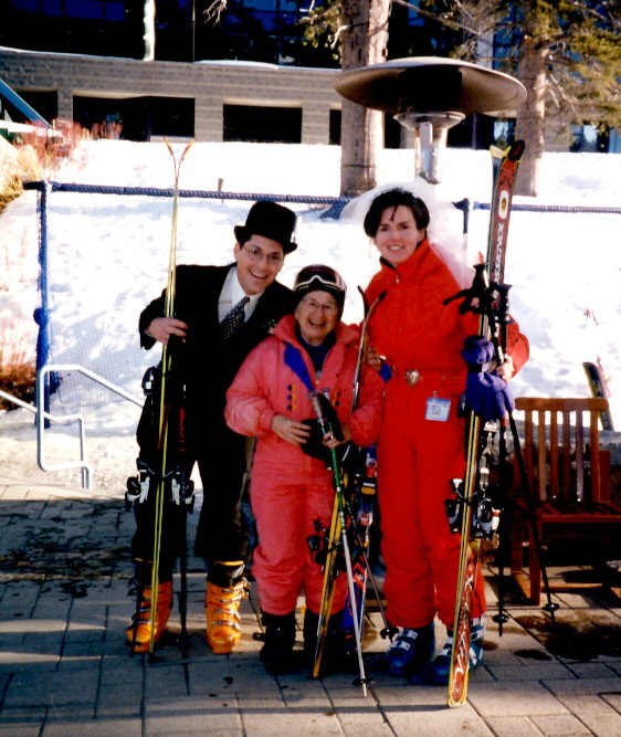 Dr. Ruth Westheimer poses with anonymous recently married couple in ski gear at the Resort at Squaw Creek