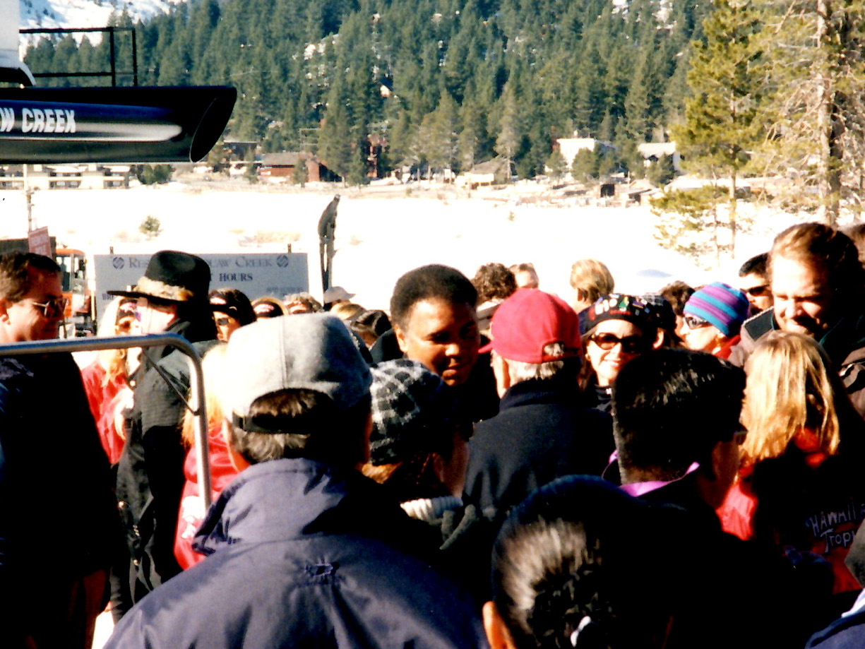 Muhammed Ali surrounded by fans at Squaw Valley USA